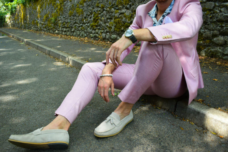 Grey loafers and pink suit