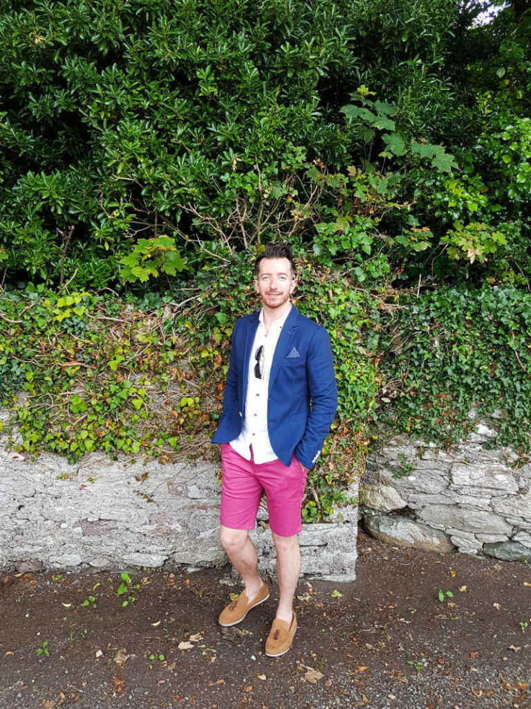 Summer style red shorts and blue blazer